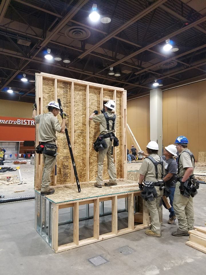 construction-workers-building-stage-platform